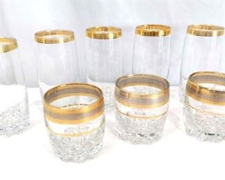 Gold Rimmed Glasses	
Eight Gold Color Rimmed Glasses. 5 tall and 3 short.