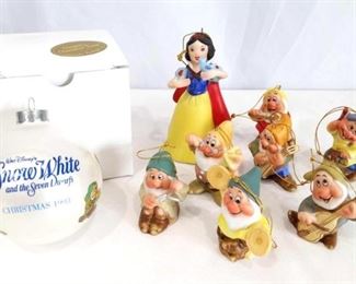Disney Snow White Christmas Ornaments	
Includes Walt Disney Schmid Christmas Ornament set with Snow White and Seven Dwarves and Schmid 1993 Single round ornament