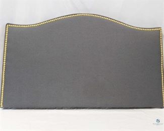 Twin Headboard	
Gray fabric and surrounded by gold studs. Nice condition. 39" x 23"