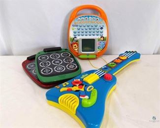 	Toys	
Sesame Street Elmo's Rock n Roll Guitar from 1998 by Tyco Preschool Toys. Vtech Wrist and Learn Touch Tablet Handwriting Toy. FlashPad Connects Virztex 33830, 1 red and 1 green. Working condition unknown