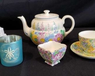Vintage Longton Chintz Ware, Simpson Smith China, English Tae Pot and More	
Longton English Chintz Ware Apple Blossom Sugar Bowl, Simpson Smith Old Royal Bone China with English Chintz Pattern Cup and Saucer, 50's English Tea Pot, Crystal Candle Holder and Blue Sand Dollar Candle Holder