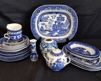 Blue on White Dishes and More	
Includes 6 serving dishes, 2 cups, 1 lg sugar bowl, 1 serving bowl, plates of various sizes and more. Some Buffalo Pottery 1909 pieces, some Japan pieces