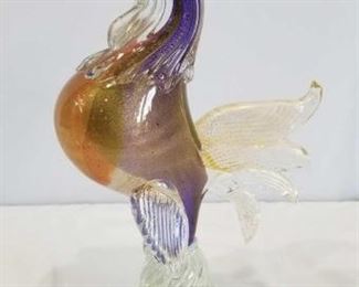 Murano Glass Rooster	
Approx. 14" Tall Purples and Gold Glass Rooster
LOCATION 8