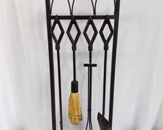 Fireplace Tool Set	
Fireplace Tool Set and stand. Includes broom, poker, shovel and tongs. Approx. 36" tall.