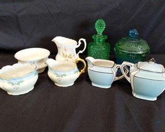 Misc Serving Pieces	
Includes 3 cream and sugar sets and 2 glass containers.