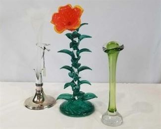 Flower Vases	
Bermuda Glass Flower Decor is 15" Tall, Modern Swedish Green Glass Vase approx. 11" Tall, (No marking found), Oneida White Frosted Glass Flower Vase with Silver Plated Base Approx. 15" tall