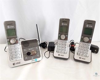 AT & T Phone System	
AT&T Cordless Phone system with 3 handsets, 2 basic bases, 1 answering system base, and some cords