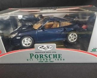 Heritage Mint 1999 Porsche 911 Turbo 1:18 Die-Cast Car	
New in original Box, 1999 Porsche 911 Turbo 1:18 Die-Cast Car