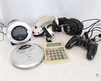 Electronics	
Includes Sony Dream Machine, Philips Headphones, Califon Headphones with 3.5MM stereo plug, Casio calculator, Lenox CD Player and Sony Gamestop Playstation 2 corded controller. Sony Dream Machine clock powers on. Other devices untested.