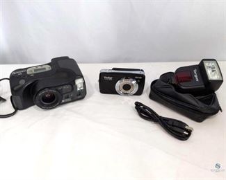 Cameras and More	
Includes Vivitar S536, Ricoh Mirai Zoom 3, Targus Flash TG-DL20C, Leather Camera case, and Camera USB cable. Working condition unknown.