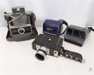 Lot of Four Cameras	
Includes Bell and Howell Electric Eye, Polaroid Impulse, Polaroid 440, and additional Polaroid Camera. Working condition unknown.