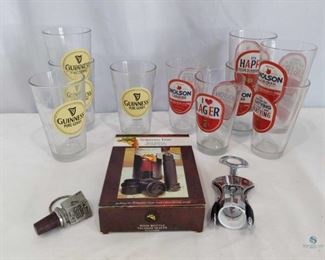 Bar Accessories	
Includes 4 Guinness Glasses, 6 Molson Lager Glasses, wine vacuum sealer, wine stopper, and bottle opener.