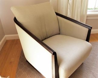 Ivory Arm Chair $65   Has casters on front legs only. 