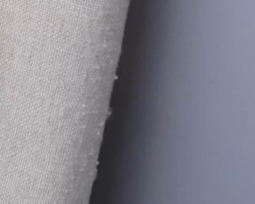 King platform bed. Neutral nubby loose-weave fabric upholstery