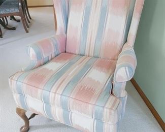 Vintage pastel wingback chair.
