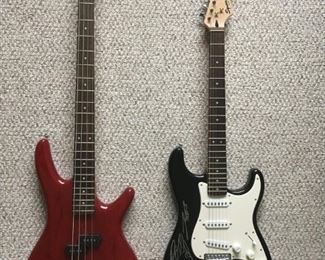 Ibanez GSR200 and autographed Fender by 3 Doors Down; also have a guitar stand.
