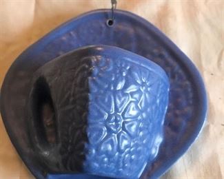 Niloak cup & saucer wall placque