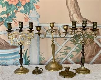Item 87:  Lot of (3) tall brass candelabras: $55                        triple candelabra (center), pair of triple candelabra with lion detail (right and left)                                                                 Two small antique brass candle holders: $20     (Sold)         
 Tallest - 11.5"  