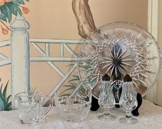 Item 83:  Waterford Crystal lot:                                                                     Cake plate - 12.5", dish - 4" x 4.75", salt & pepper shakers, creamer$95.00
