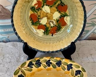 Item 105:  Two decorative yellow hued plates:                               Largest - 9.75": $38.00