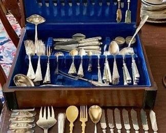 Item 112:  Enormous Set of 1907 Geislingen WMS German flatware- Pattern # 34:  $445                                                                                          12 fish knives, 12 dinner knives, 12 dessert knives, 12 knife rests, 1 Bakelite serving set, sugar tongs, 12 dinner forks, 12 salad forks, 12 soup spoons, 12 fish forks, 12 oval spoons, 12 coffee spoons, 2 cheese knives, 1 gravy ladle, 2 salt & pepper dishes, 1 slotted spoon, 1 large handled knife & fork, 1 large soup ladle, 1 large serving spoon, 1 oval serving spoon, 1 pie server