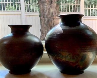 Item 124:  (2) Raku vases by Richard Foye:                                           Small - 11":   $60                                                                                                        Large - 13":   $80
