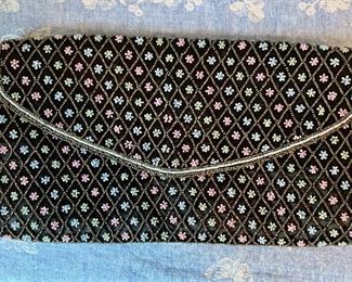 Item 248:  Black beaded bag with flower design:  $55.00 