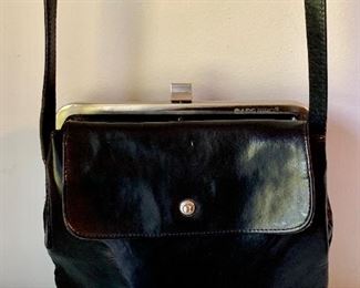 Item 430:  Black  leather cross body bag: $45.00 
