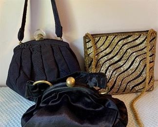Item 434:  Two black satin and one gold and black sequin evening bags:  $80.00