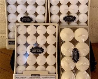 Item 502:  Four boxes of white votive candles:  $15