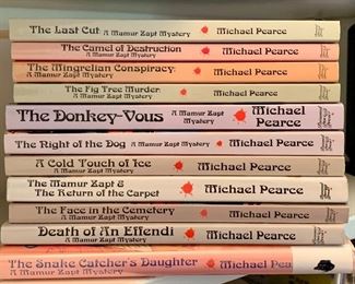 Item 484:  Eleven Michael Pearce books:  text for pricing
