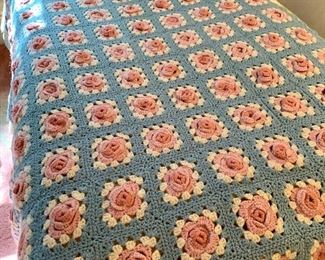 Item 449:  Hand knitted granny square afghan with rose design:  $25