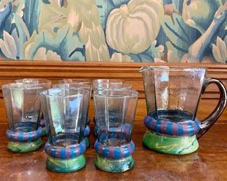 Item 319:  Mackenzie Childs Water Pitcher and 8 Glasses, hand decorated - Victoria and Richard (1991)- there is a slight condition issue with the pitcher - please see photos: $195 for set