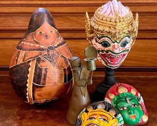 Item 579:  Lot of figural items, several masks, copper candle holder and gourd figure: $15