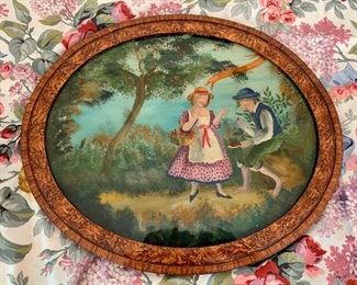 Item 580:  Antique reverse painting on glass, oval frame, girl and boy berry picking -18.75" x 16": $165