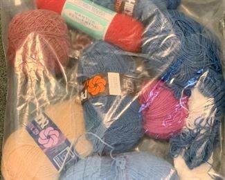 Item 564:  Lot of miscellaneous yarn - baby blue, red, true blue, pink and melon: $15