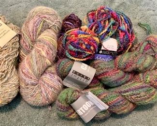 Item 567:  Lot of assorted Yarn (multi-color, tan on left and pink): $14