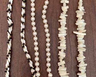 Item 266:  Three necklaces with one faux pearl necklace: 
$16.00  