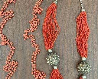 Item 270:  Two coral colored necklaces:  $35.00