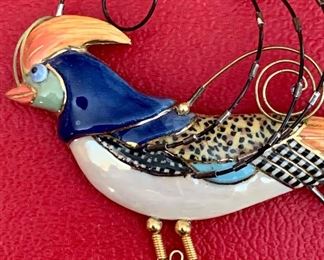 Details of bird pin.