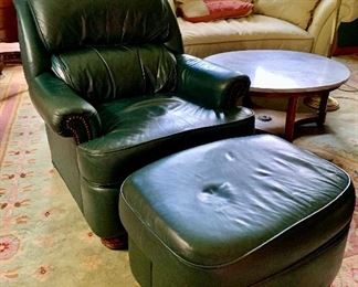 Item 373:  Green Leather Recliner with nailhead trim and Ottoman:  $375                                                                                            Recliner - 29.5"l x 22.5"w x 33"h                                                                Ottoman - 26"l x 20"w x 16"h