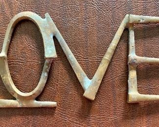 Item 516:  Love sign welded from old nails:  $12