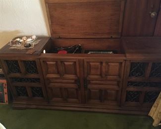 Vintage mid century modern GE console stereo record player with AM/FM radio from late 1960"s. It worked beautifully $135.00