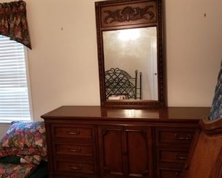 Triple dresser with attached mirror 