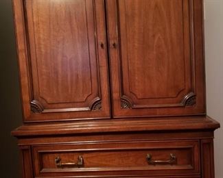 Armoire/ 3 wooden drawers behind doors 