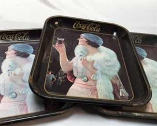 https://connect.invaluable.com/randr/auction-lot/distressed-vintage-coca-cola-tin-trays_4024699A76