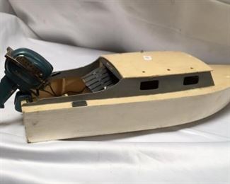 https://connect.invaluable.com/randr/auction-lot/evinrude-toy-boat-motor-on-a-wooden-toy-boat_56C4AF49C2