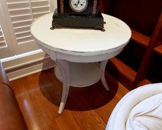 White painted round side table