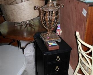 Black nightstand, iron lamp