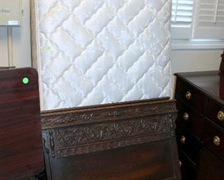 Antique English carved oak day bed with custom mattress